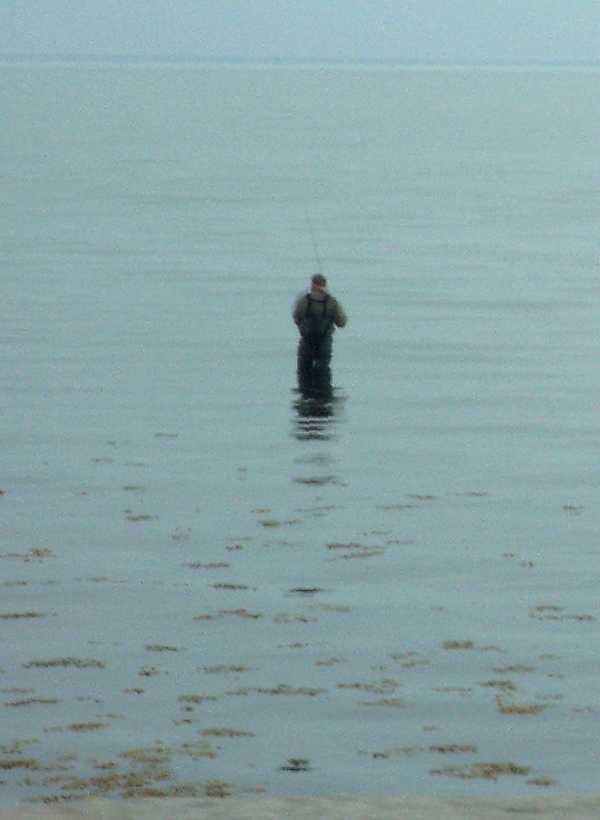Fishing in waders.jpg